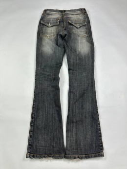 Washed flared denim with flaps