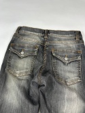 Washed flared denim with flaps