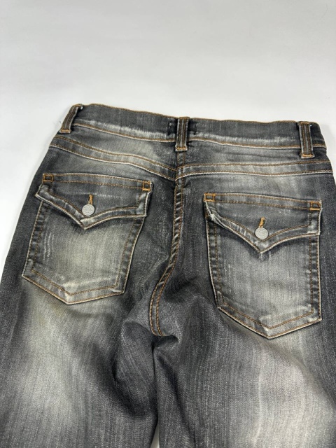 Washed flared denim with flaps
