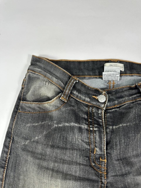 Washed flared denim with flaps