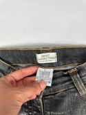 Washed flared denim with flaps